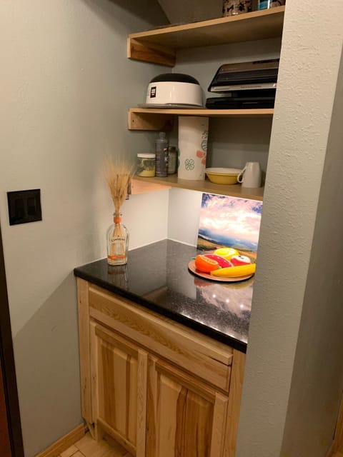 Primary bedroom has mini bar in the separate private vestibule.