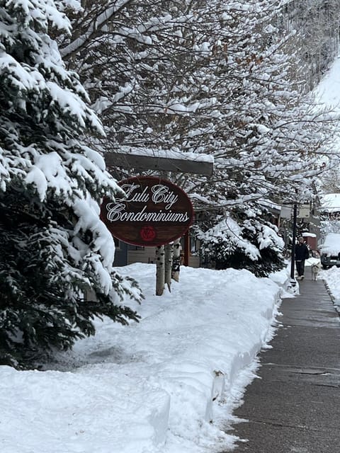 Unlit sign.  Hard to see at night when you're turning into the reserved parking