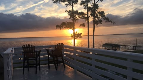 Sunrise from the crows nest upstairs off primary bedroom. The view is worth it!