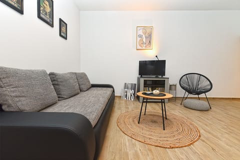 Standard Apartment, 1 Queen Bed with Sofa bed (0360) | Living area | TV