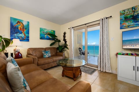 Your beachfront escape continues inside with a bright, inviting living space and private beachfront balcony.