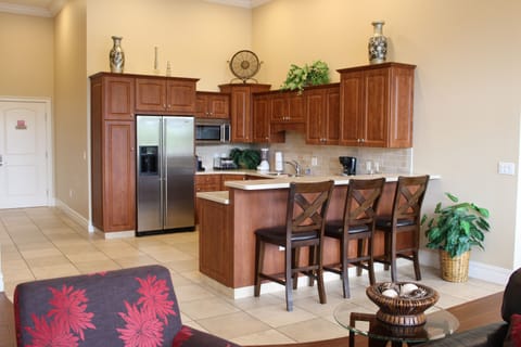 Luxury Condo, Multiple Beds | Private kitchen | Shared fridge, microwave