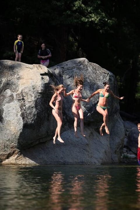 Off the jump rock at the swimming hole