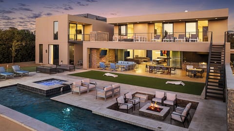 Stunning two-story estate with rooftop terrace & pool views