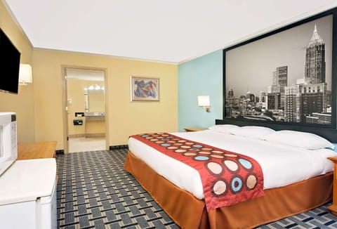 Desk, laptop workspace, blackout drapes, iron/ironing board