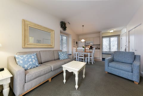 Surrounded by towering pines and the gentle sounds of a flowing creek, this renovated Shores studio offers peace, privacy, and the perfect setting for a romantic bayfront getaway.
