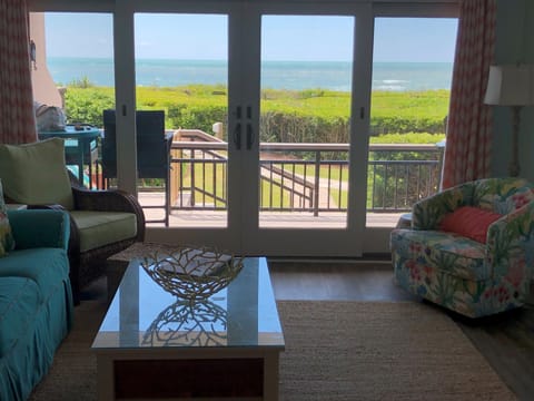 Living room looking out to deck and ocean 