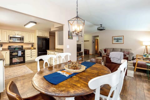 The dining room table has plenty of seating for everyone.