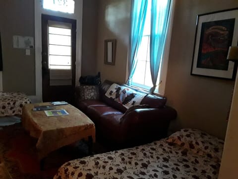 The front room, showing two singles set up, with room for two more if needed.