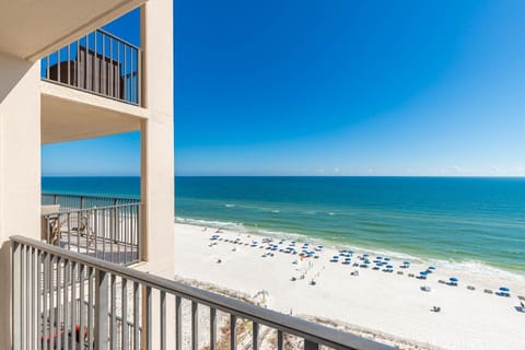 Enjoy breathtaking views from the balcony, where you can relax and soak in the vibrant colors of the water and beach