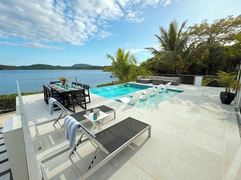Rainbow Beach House has a new sun deck, pool, outside dining, and sitting area