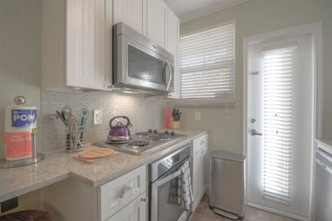 Our fully equipped kitchen includes fridge, stove, oven, microwave, dishwasher, Keurig coffee maker, and all the essentials.