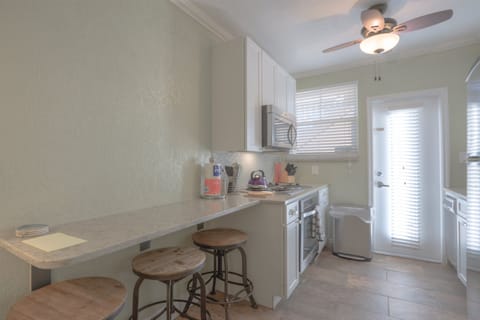 A breakfast bar where you can enjoy your meals close to our fully equipped kitchen.