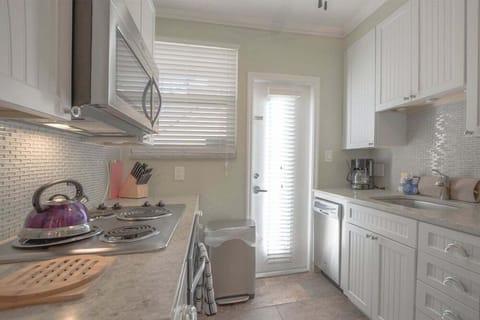 Our fully equipped kitchen includes fridge, stove, oven, microwave, dishwasher, Keurig coffee maker, and all the essentials.