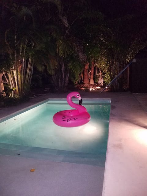 The private pool glows turquoise at night!