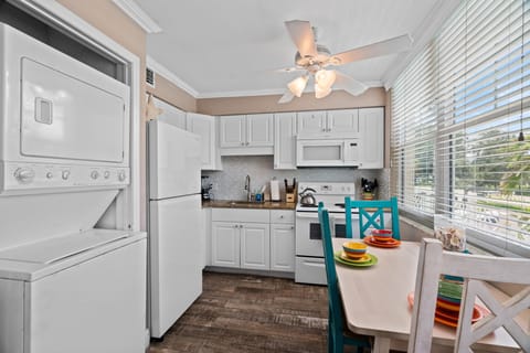 Beautiful dining area by the window, located between the living and kitchen space. 

Convenient in-unit laundry so you can pack light.