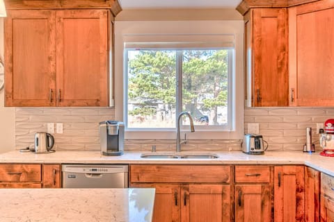 Kitchen - Dishwasher, large sink, and a Keurig coffee pot