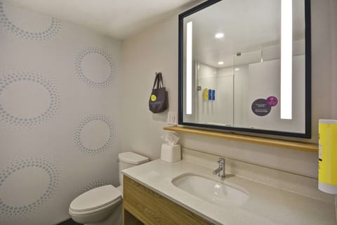 Shower, designer toiletries, hair dryer, bathrobes