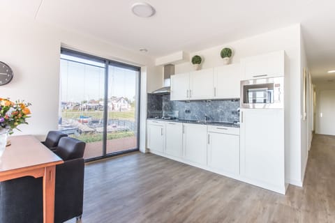 Apartment | Private kitchen | Fridge, microwave, oven, stovetop