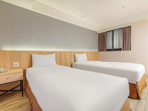 Standard Twin Room, No Windows | Down comforters, minibar, desk, blackout drapes