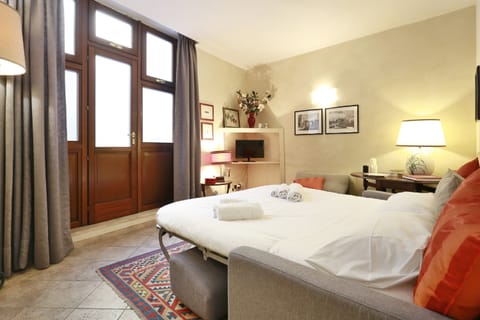 Apartment, 2 Bedrooms | Living area | Flat-screen TV