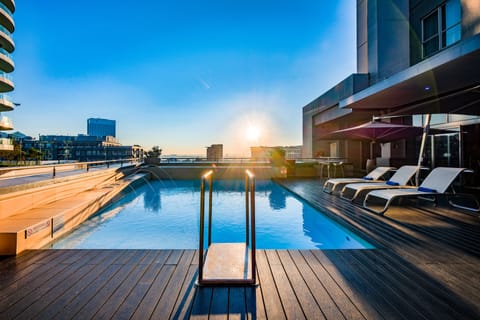 Outdoor pool, pool umbrellas, sun loungers