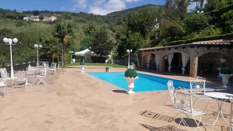 Seasonal outdoor pool, pool umbrellas, sun loungers