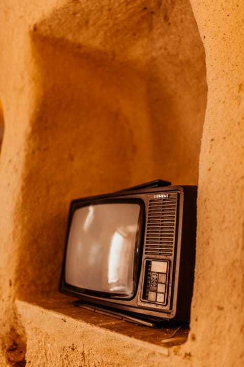 Family Suite, Jacuzzi or Courtyard View | Television