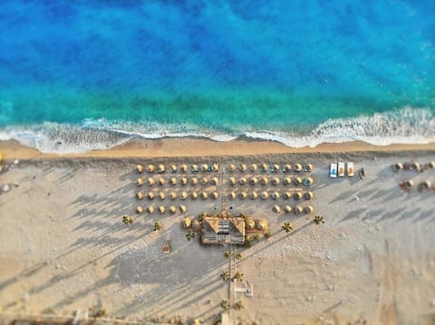 Private beach, sun loungers, beach umbrellas, beach bar