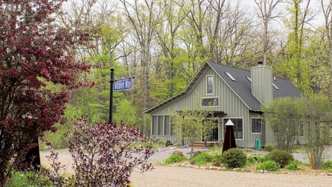 Tucked away in the private, wooded community of Walden Woods