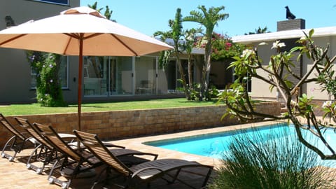 2 outdoor pools, open 6:00 AM to 10:00 PM, pool umbrellas, sun loungers