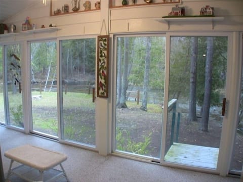 your view of the river from the enclosed all season room.