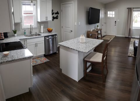 Our open concept eat-in kitchen has all the necessary appliances and utensils!