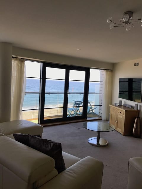 Living area with stunning beach views 