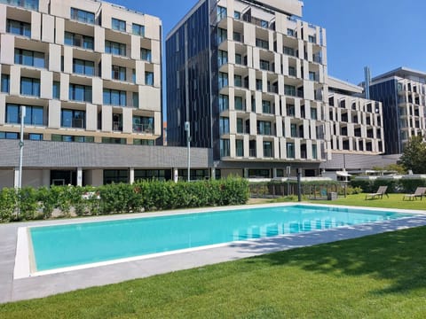 Seasonal outdoor pool, open 9:00 AM to 8:00 PM, sun loungers