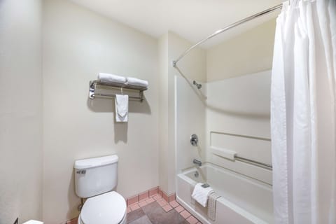 Suite, 1 King Bed, Non Smoking, Refrigerator & Microwave | Bathroom | Combined shower/tub, eco-friendly toiletries, hair dryer, towels