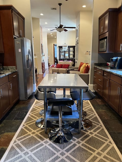 Double sided kitchen, bakers table in center for gathering. Seating for 6, enjoy