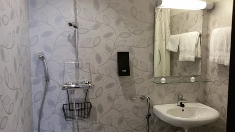 Shower, free toiletries, hair dryer, towels