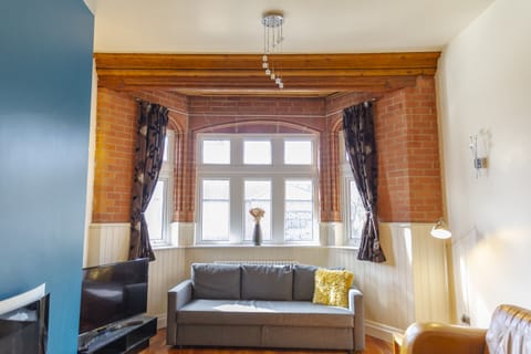 Apartment, Multiple Beds | Living room | 30-inch flat-screen TV with digital channels, TV, fireplace