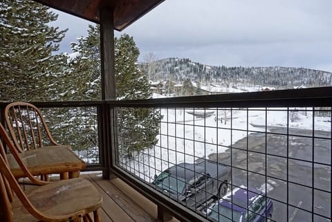 Covered balcony with mountain views