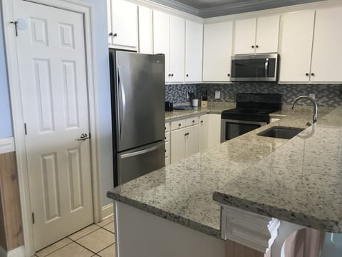 Beautiful kitchen perfect for entertaining! Coffee maker & Keurig included!