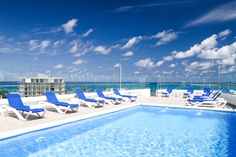 Outdoor pool, open 8:00 AM to 7:00 PM, sun loungers