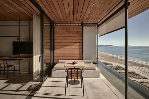 Seaview Terrace Suite | Minibar, in-room safe, individually decorated, individually furnished
