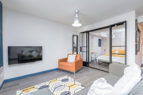 Studio, 1 Double Bed with Sofa bed | Living area | Flat-screen TV