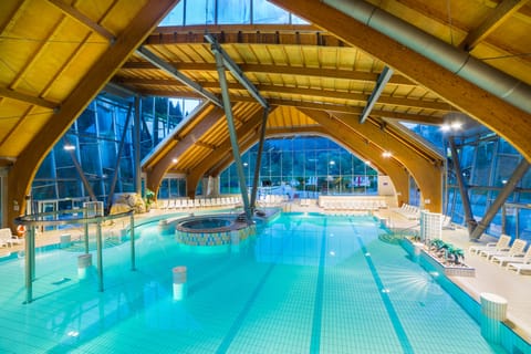 Indoor pool, 2 outdoor pools, open 9:00 AM to 8:00 PM, pool umbrellas