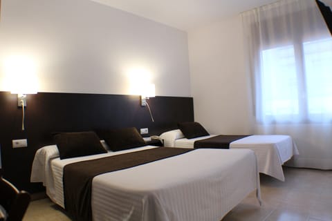 Standard Triple Room | In-room safe, desk, iron/ironing board, free WiFi