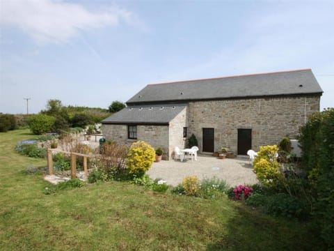 Rear view of property and garden