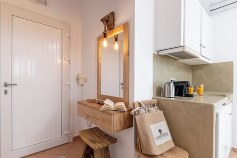 Comfort Garden & Sea View Apartment | Living area | 32-inch flat-screen TV with digital channels, TV