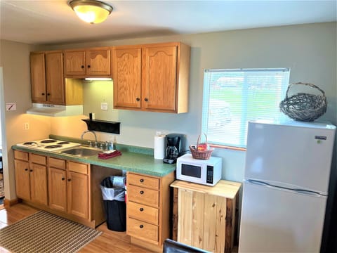 Kitchen with stovetop, no oven