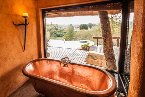 Hambleden Family Suite | Bathroom | Designer toiletries, hair dryer, slippers, towels